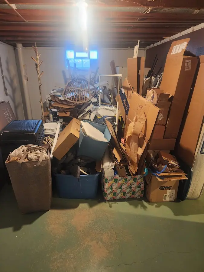 Roll-off dumpster container at job site for 2 Yard Dumpster Rental in Mountainside